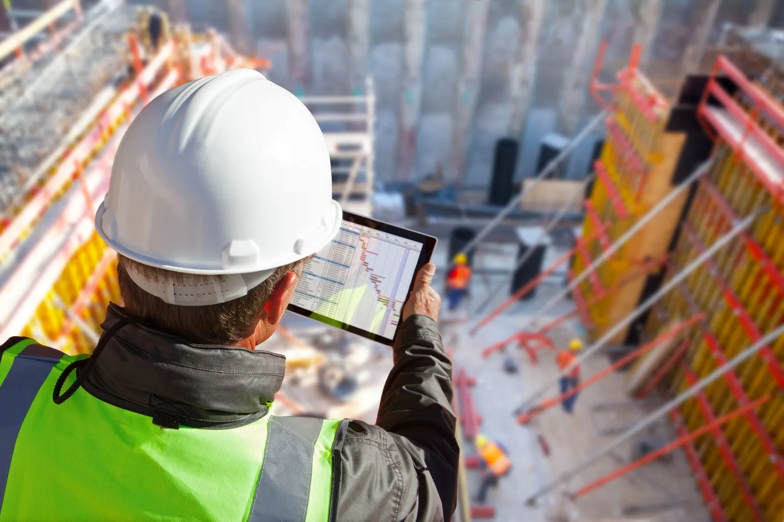 A field inspector using CommunityWorks on a tablet on site